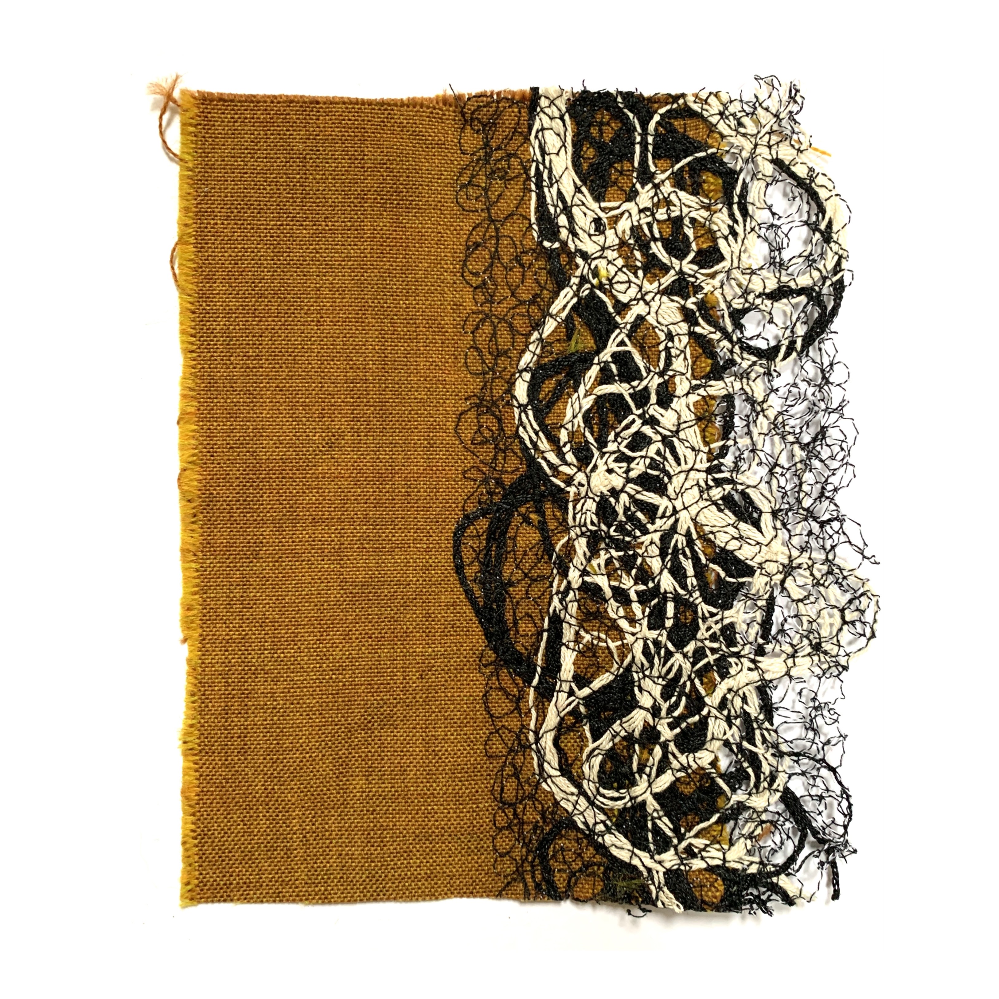 tangle threads edging on ochre wool. Experimental textile edging sample